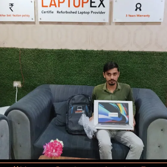 Suresh from Arun with refurbished T14 laptop from LaptopEx