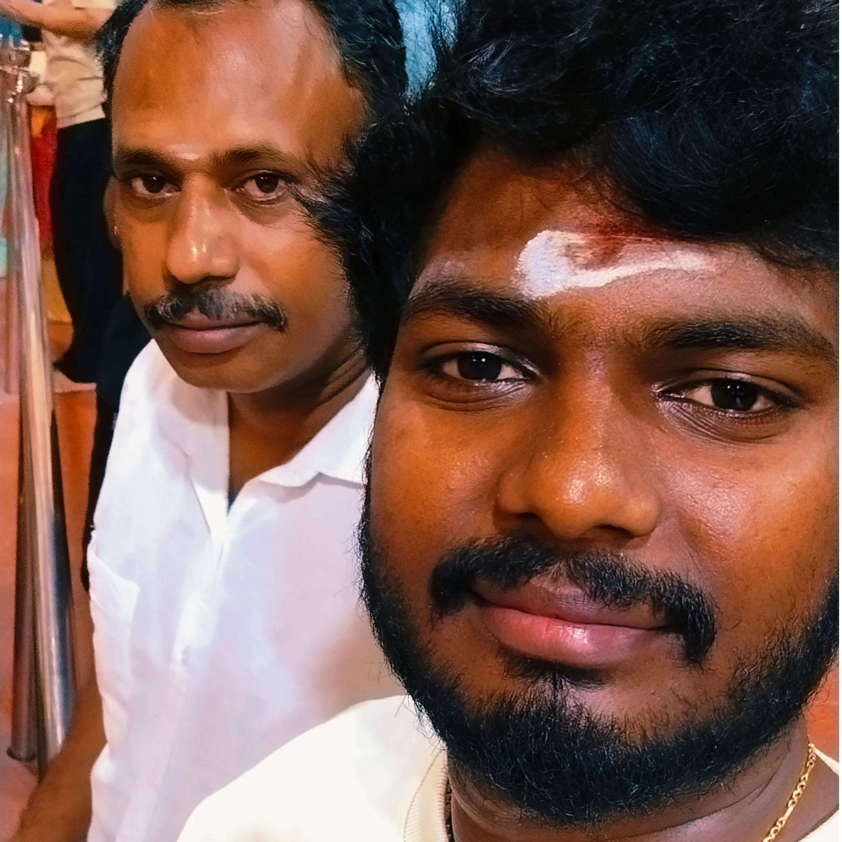 Naveen R